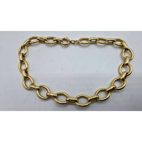 95 - An unmarked yellow metal fancy chain link bracelet 22 cm, hallmarked with anchor and work date lette... 