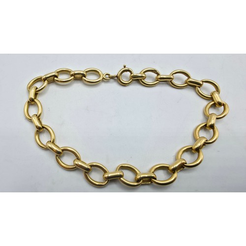 95 - An unmarked yellow metal fancy chain link bracelet 22 cm, hallmarked with anchor and work date lette... 