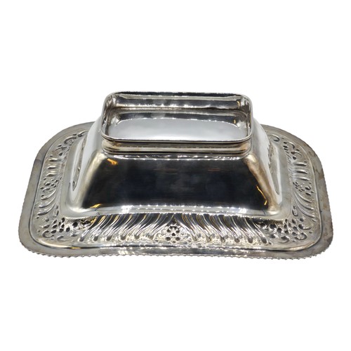 118 - A sterling silver serving dish with repousse decoration and beaded rim by Henry Atkin Sheffield 1894... 