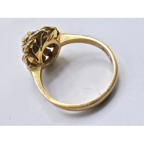 100 - A continental 18ct gold pearl and enamel dress ring, size O, 5.5g