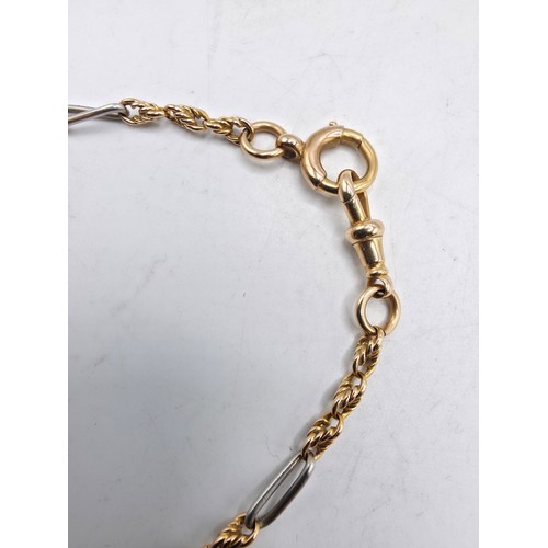 112 - Two unmarked yellow and white metal bracelets 20 cm and 21 cm, 20 g
