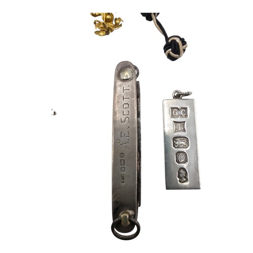 85 - A collection of yellow and white metal items to include costume jewellery , pocket watch, sterling s... 