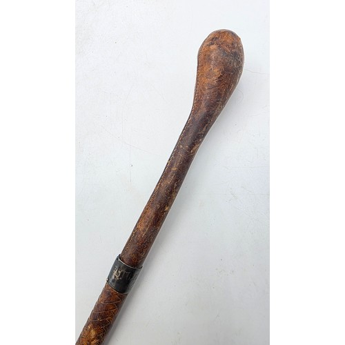 261 - A brown leather sporting stick, with hallmarked silver collar marked Swaine Adeney and bears indisti... 