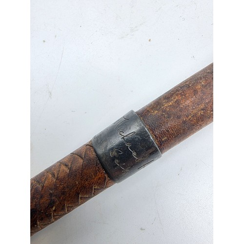 261 - A brown leather sporting stick, with hallmarked silver collar marked Swaine Adeney and bears indisti... 