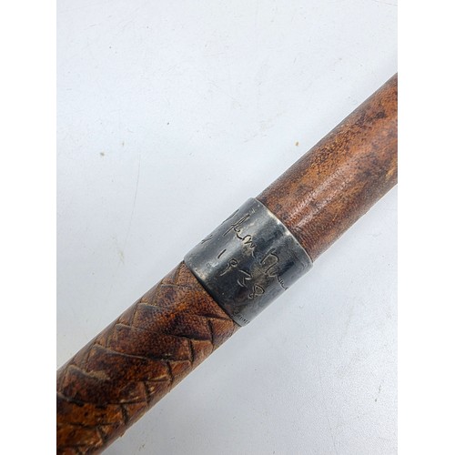 261 - A brown leather sporting stick, with hallmarked silver collar marked Swaine Adeney and bears indisti... 