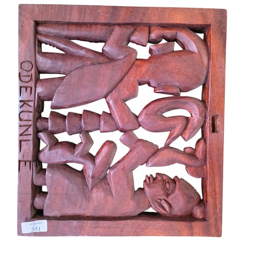 351 - Three West African hardwood sculptures stylised Weaver and two carved hardwood wall hangings, one ma... 