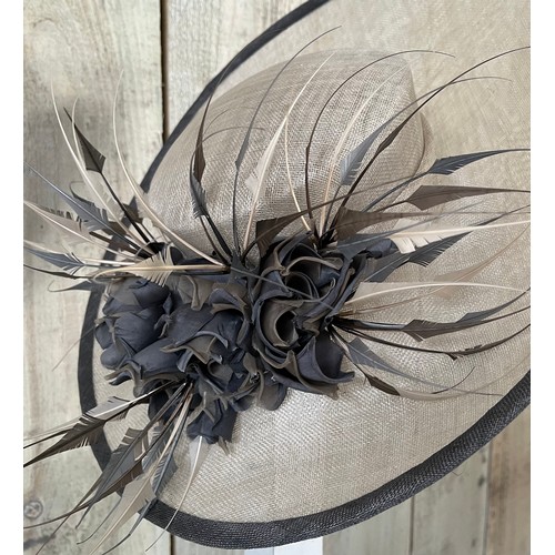 265 - A bespoke Rachel Trevor Morgan, London, pale silver/taupe/grey fine straw hat, sidesweep with hand m... 