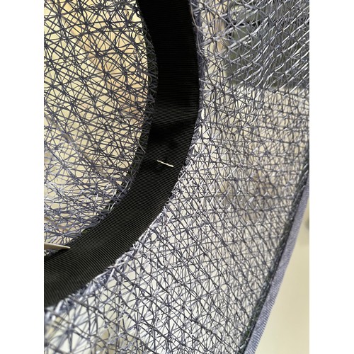 266 - A bespoke Rachel Trevor Morgan, London, sky blue fine mesh straw hat, with green flower and daisy tr... 