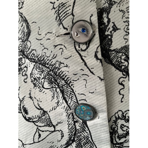 284 - A Desigual printed ladies three quarter length frock coat, with ornate buttons, label size 42cm, in ... 