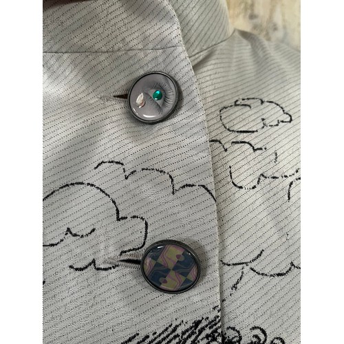 284 - A Desigual printed ladies three quarter length frock coat, with ornate buttons, label size 42cm, in ... 