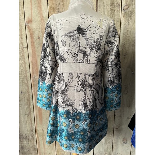 284 - A Desigual printed ladies three quarter length frock coat, with ornate buttons, label size 42cm, in ... 