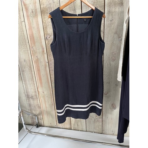 288 - A quantity of designer day wear to include Paul Costelloe Dressage linen dress, Jean Muir navy top a... 