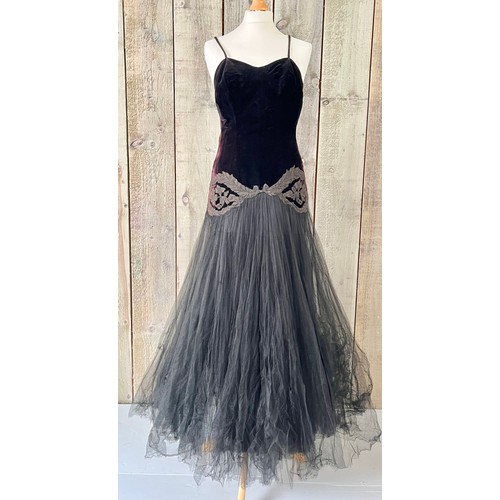 273 - A 1930s velvet and tulle skirt evening dress, with applique detail to waist. Some fading and holes/d... 