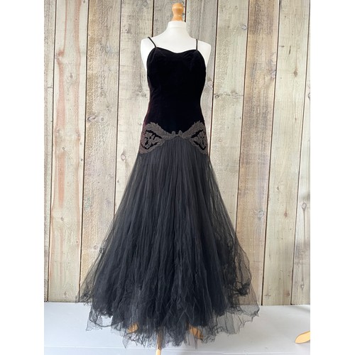 273 - A 1930s velvet and tulle skirt evening dress, with applique detail to waist. Some fading and holes/d... 
