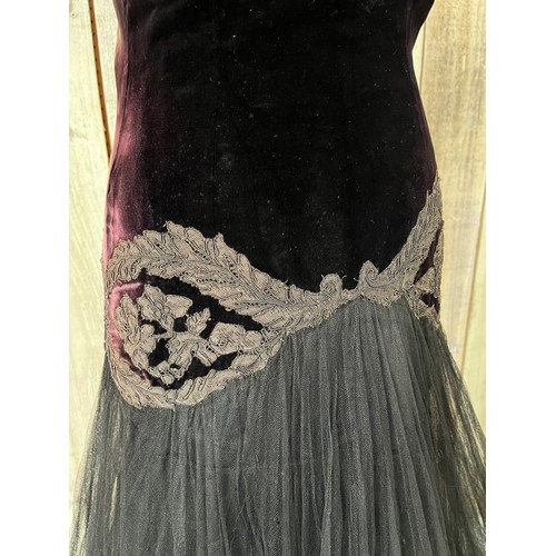 273 - A 1930s velvet and tulle skirt evening dress, with applique detail to waist. Some fading and holes/d... 