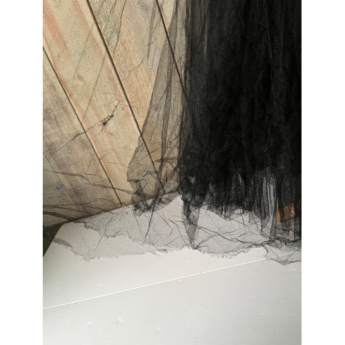 273 - A 1930s velvet and tulle skirt evening dress, with applique detail to waist. Some fading and holes/d... 