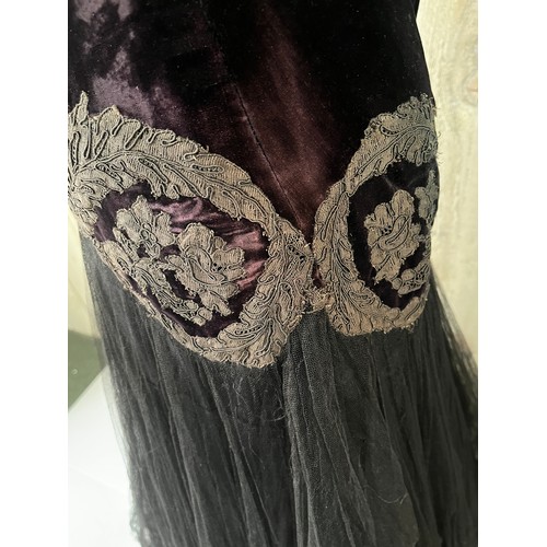 273 - A 1930s velvet and tulle skirt evening dress, with applique detail to waist. Some fading and holes/d... 
