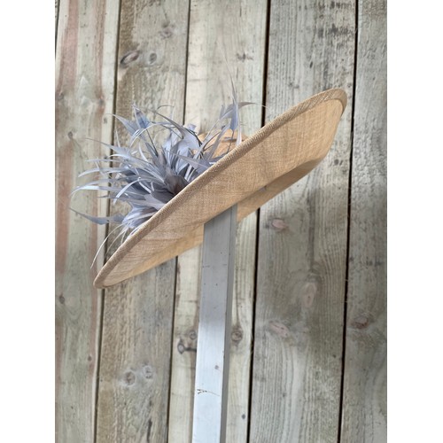 293 - A bespoke Rachel Trevor Morgan, London, natural fine straw hat, sidesweep with grey feather trimming... 