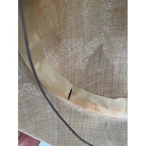 293 - A bespoke Rachel Trevor Morgan, London, natural fine straw hat, sidesweep with grey feather trimming... 