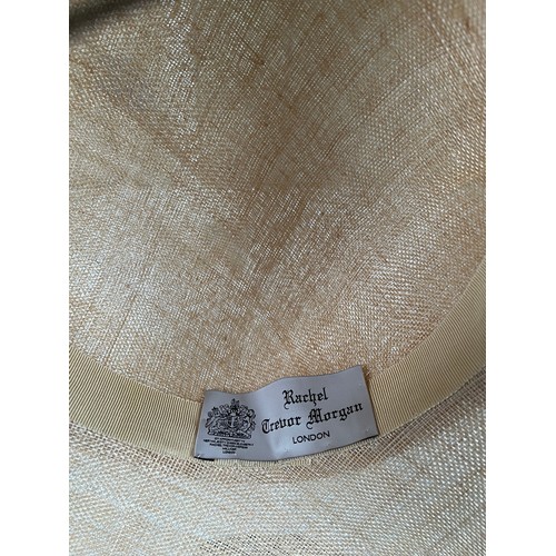293 - A bespoke Rachel Trevor Morgan, London, natural fine straw hat, sidesweep with grey feather trimming... 