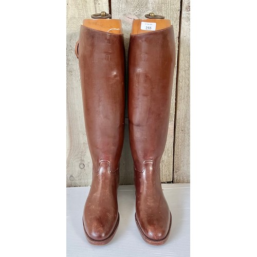 255 - A pair of brown leather Gents riding boots,  sole measures 29cm, with wooden trees. Condition, in us... 