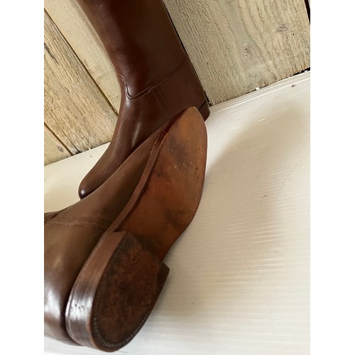 255 - A pair of brown leather Gents riding boots,  sole measures 29cm, with wooden trees. Condition, in us... 
