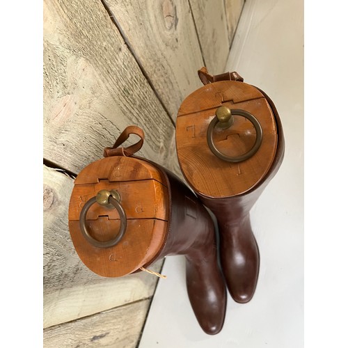 255 - A pair of brown leather Gents riding boots,  sole measures 29cm, with wooden trees. Condition, in us... 