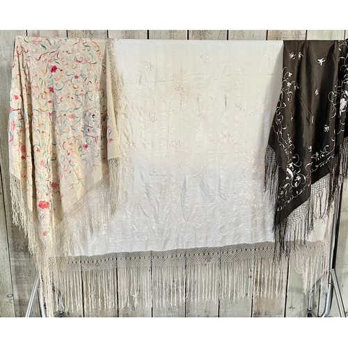 290 - a quantity of silk vintage shawls
