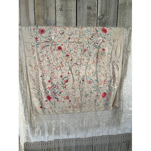 290 - a quantity of silk vintage shawls