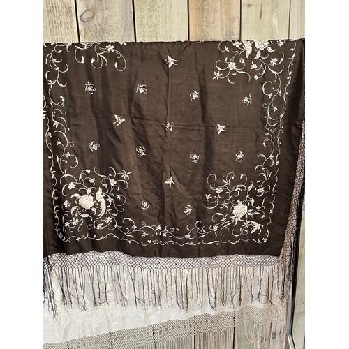 290 - a quantity of silk vintage shawls