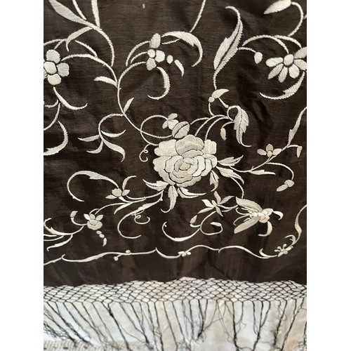 290 - a quantity of silk vintage shawls