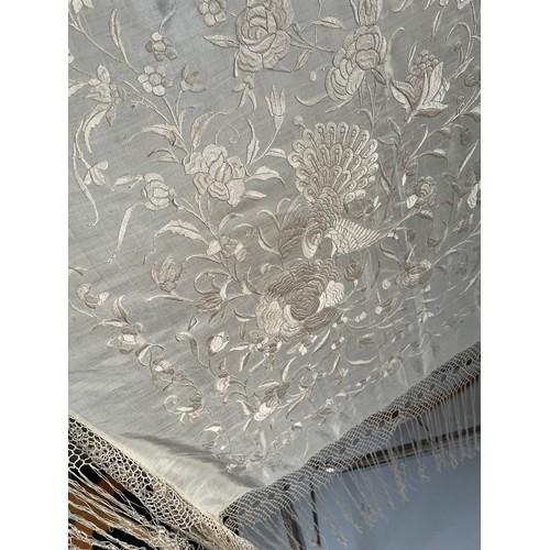 290 - a quantity of silk vintage shawls