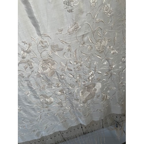 290 - a quantity of silk vintage shawls