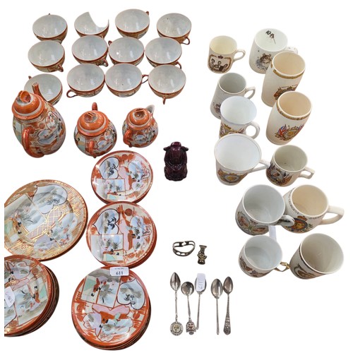 476 - A Japanese egg shell porcelain tea set and commemorative mugs.