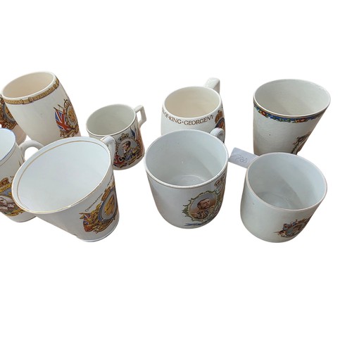476 - A Japanese egg shell porcelain tea set and commemorative mugs.