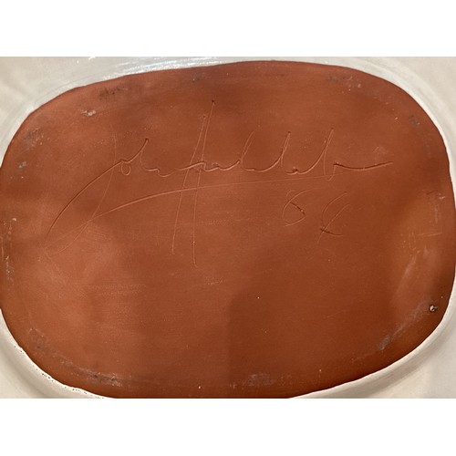 478 - Ceramics, 2 large ceramic platters, one etched signature to base, one painted to base, 46 cm x 38 cm... 