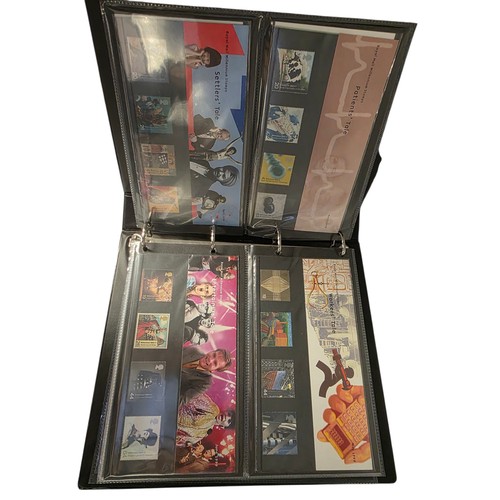 489 - A album collection of Millennium related first day covers together with millennium related postcards... 