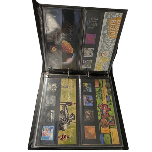 489 - A album collection of Millennium related first day covers together with millennium related postcards... 