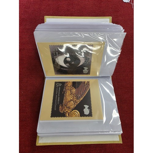 489 - A album collection of Millennium related first day covers together with millennium related postcards... 