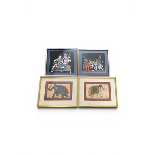 493 - Two pairs of framed and glazed prints on material depicting Asian elephants and Thai dancers.