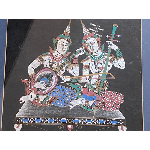 493 - Two pairs of framed and glazed prints on material depicting Asian elephants and Thai dancers.