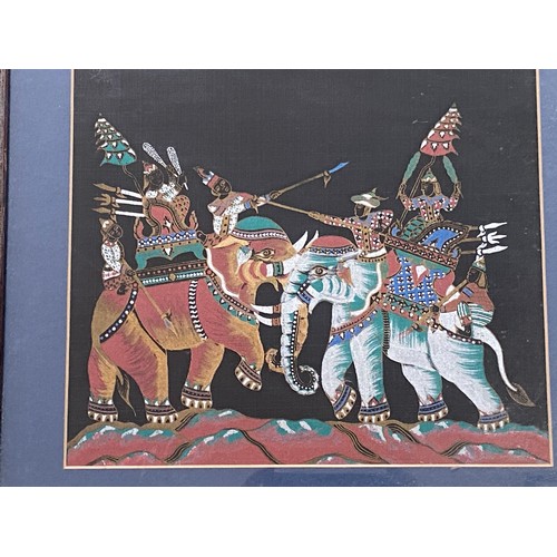493 - Two pairs of framed and glazed prints on material depicting Asian elephants and Thai dancers.