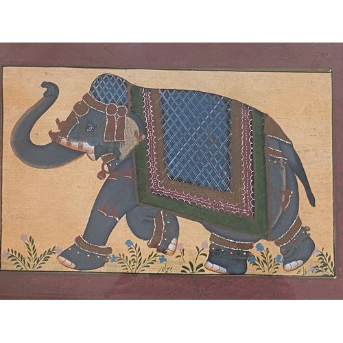 493 - Two pairs of framed and glazed prints on material depicting Asian elephants and Thai dancers.