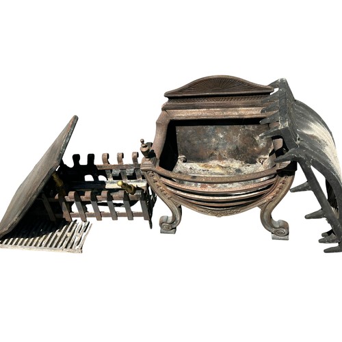494 - A quantity of fireplace items to include a heavy fire back plate,  a heavy fire basket etc, see all ... 