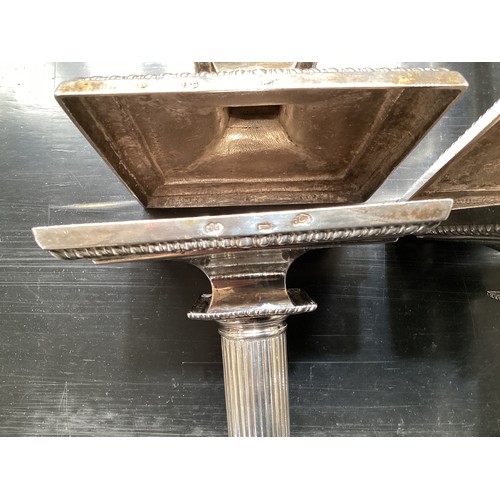 117 - A set of four solid Irish silver column candlesticks on square fluted bases, hallmarked JW, 30 cm H,... 