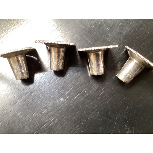 117 - A set of four solid Irish silver column candlesticks on square fluted bases, hallmarked JW, 30 cm H,... 