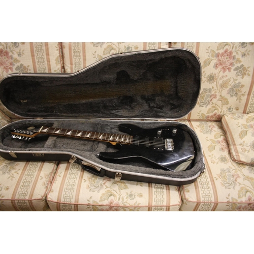 685 - CASED ELECTRIC GUITAR