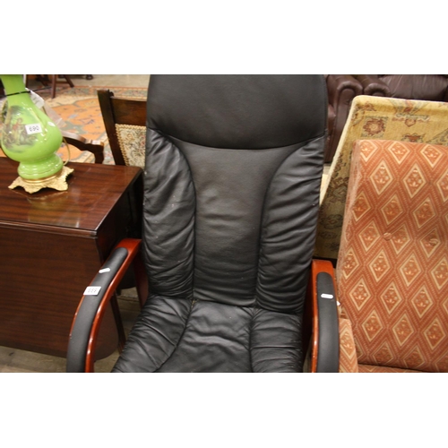 689 - LEATHER ARMCHAIR