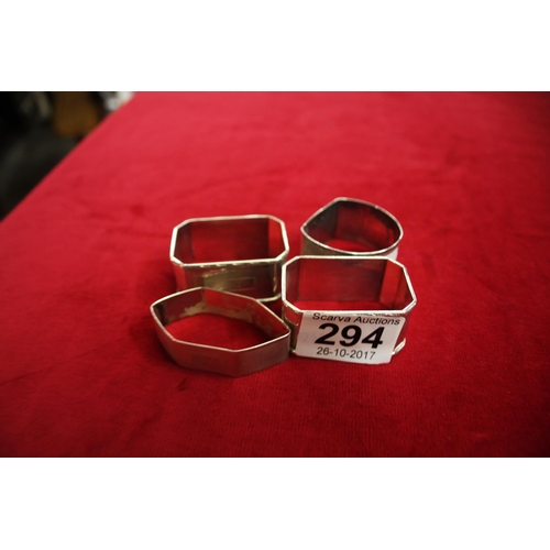 294 - 4 SILVER NAPKIN RINGS