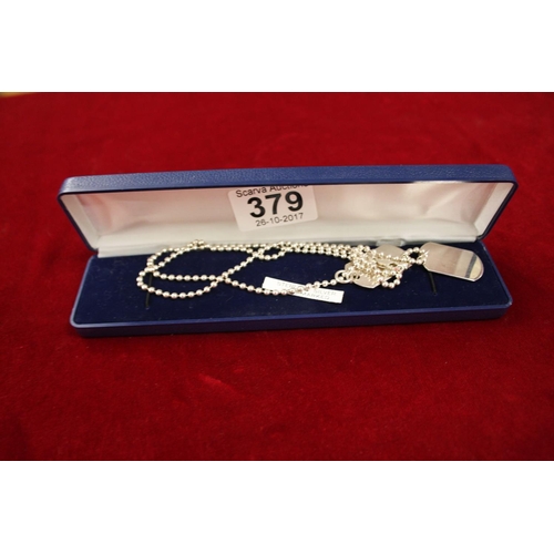 379 - PAIR OF SILVER DOG TAGS